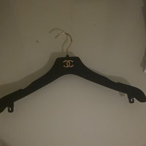 CHANEL Black Hanger with Gold Emblem